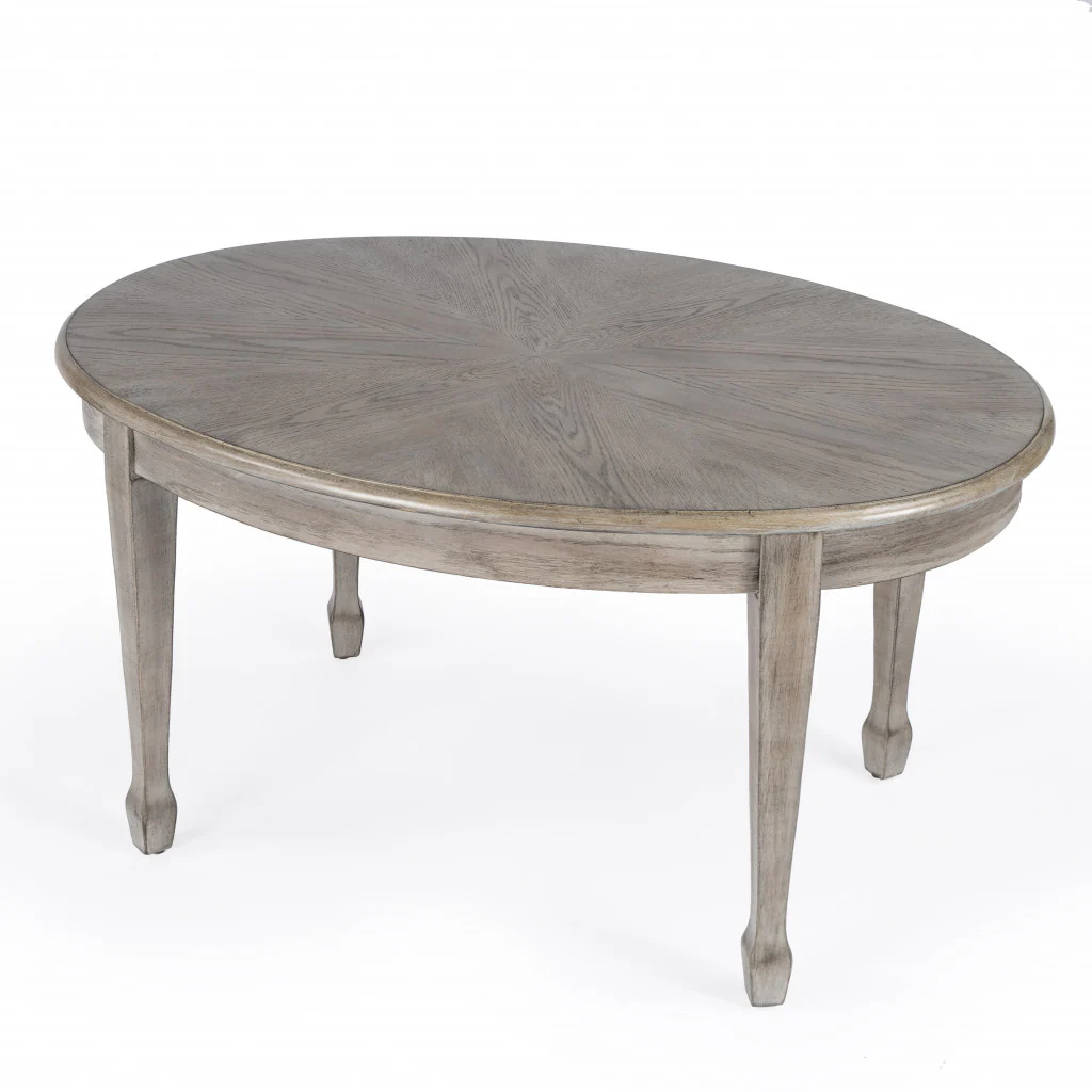 38" DriftWood Solid And Manufactured Wood Oval Distressed Coffee Table By Homeroots