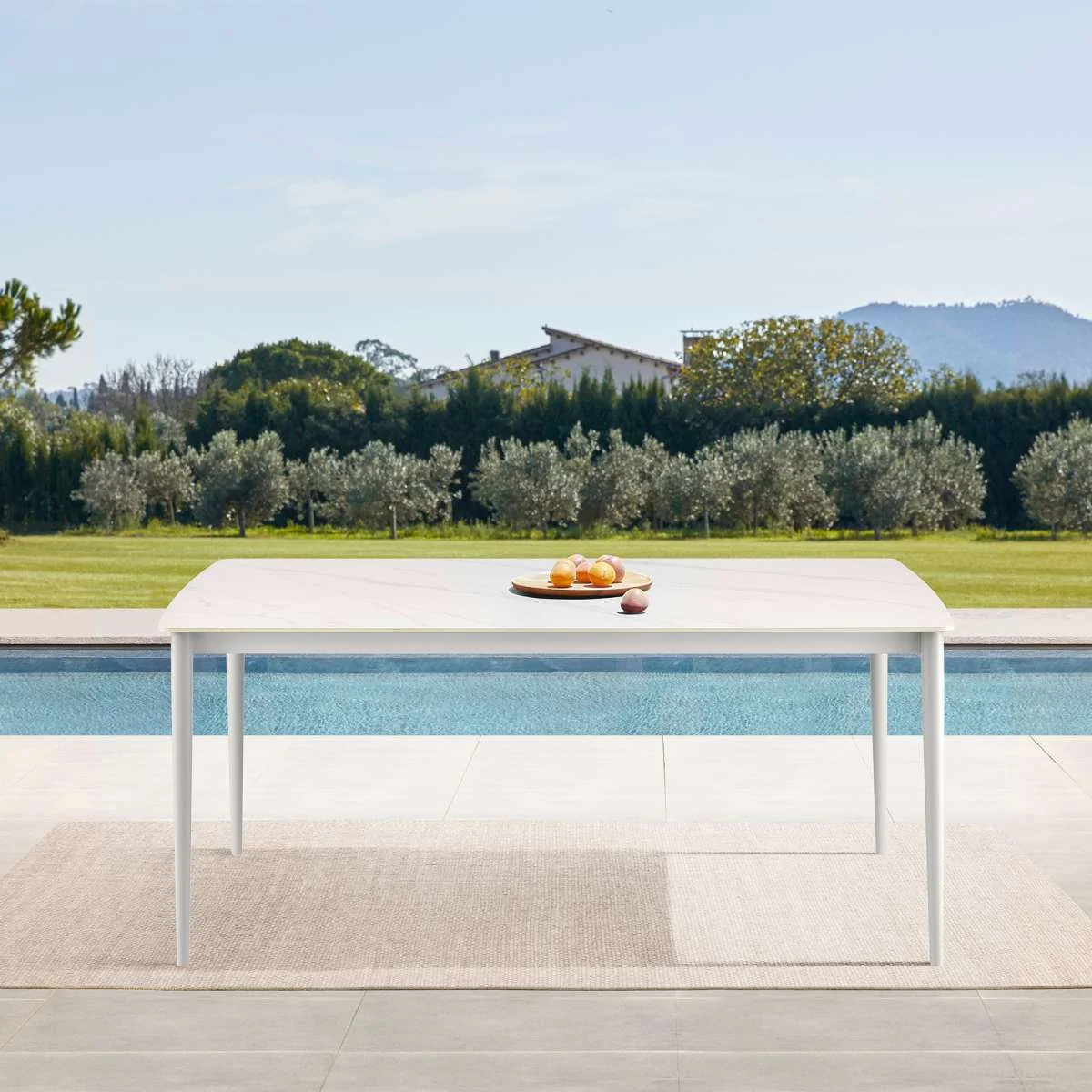 Rhodes Outdoor Patio Rectangular Dining Table in Snowy Sintered Stone and Porcelain Finish By Armen Living