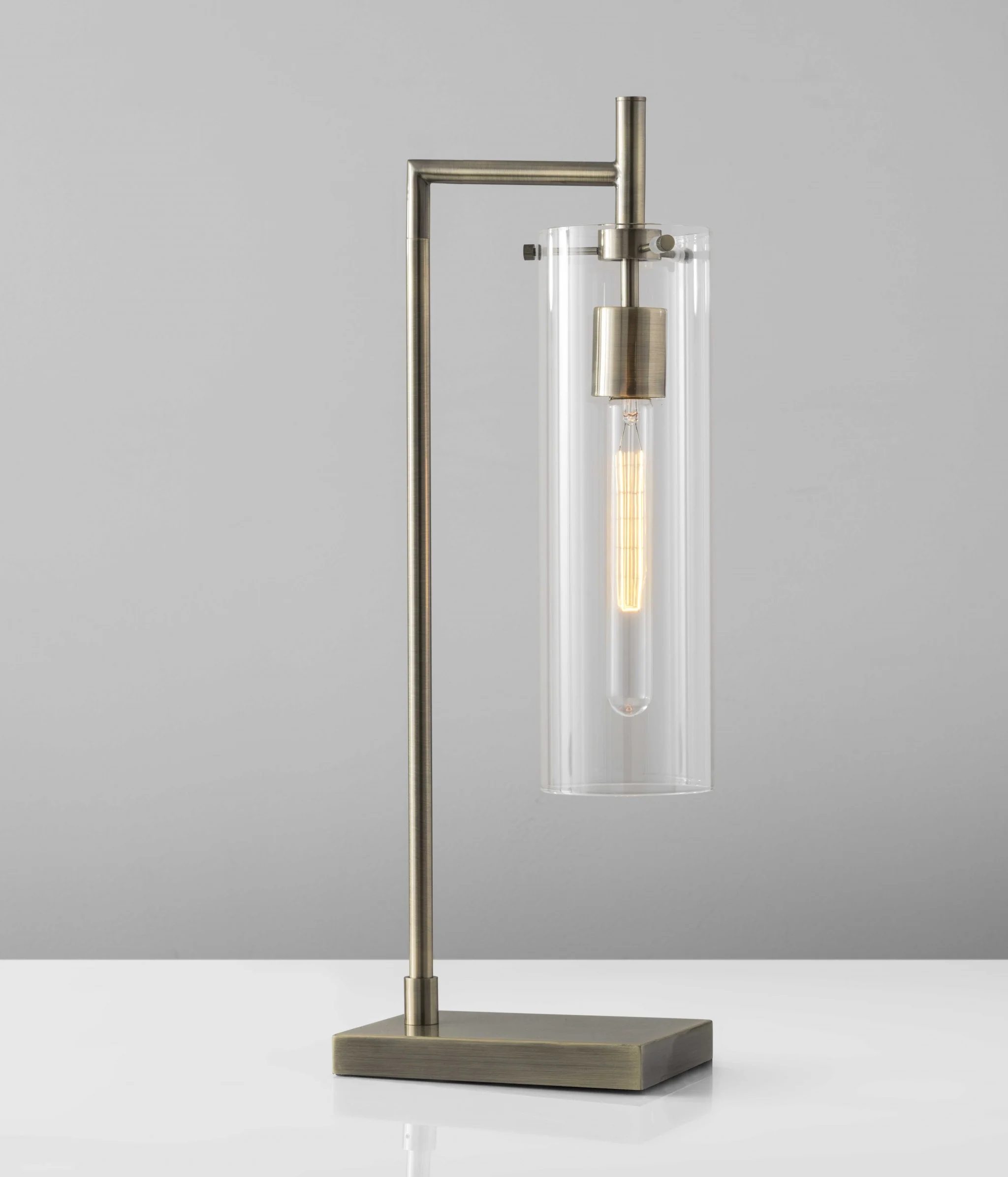 Sleek Clear Glass Cylinder Shade with Vintage Filament Bulb Antique Brass Metal Table Lamp By Homeroots